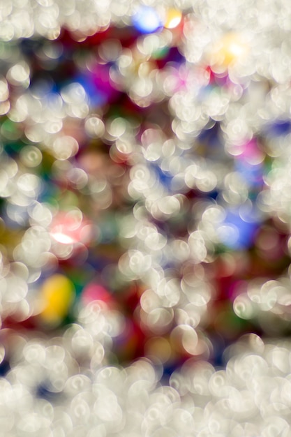 Abstract glitter color lights chrismas background. de-focused