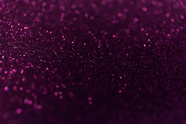 Abstract glitter shining lights background. De-focused lights