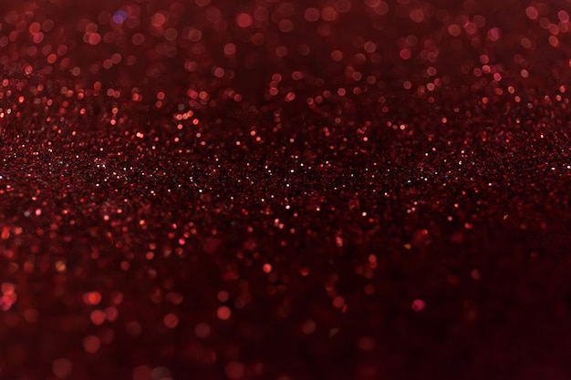 Abstract glitter shining lights background. De-focused lights