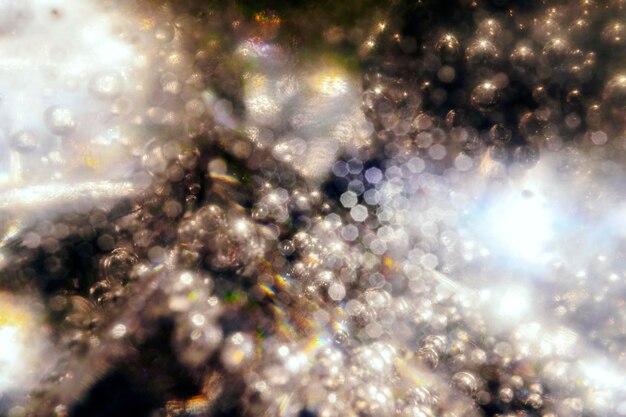 Photo abstract glitter vintage lights background and bokeh unfocused