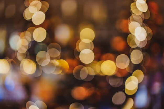 Photo abstract gold bokeh light luxury blurred background defocused image of illuminated christmas light