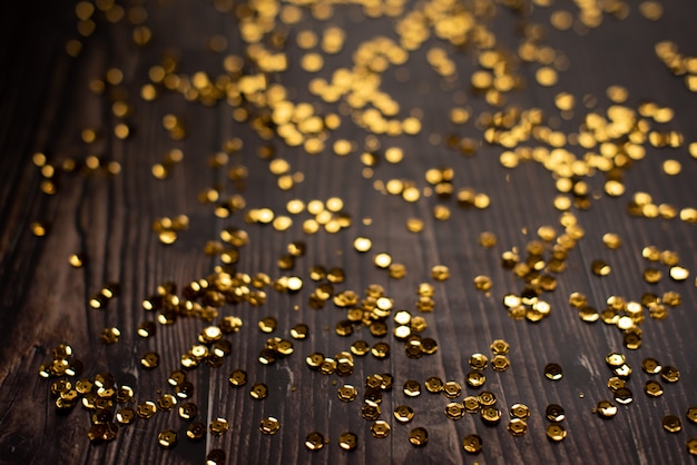 Abstract gold bokeh with black background