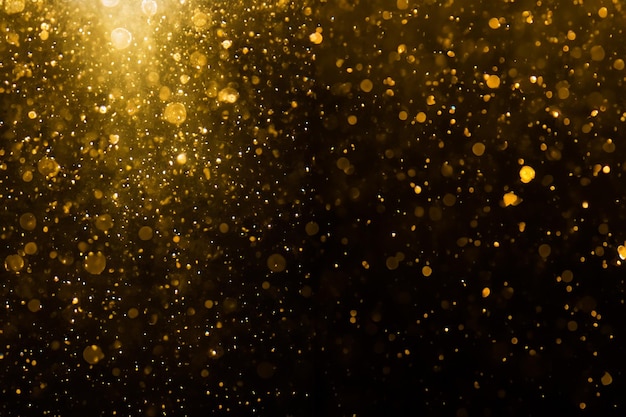 Abstract gold bokeh with black