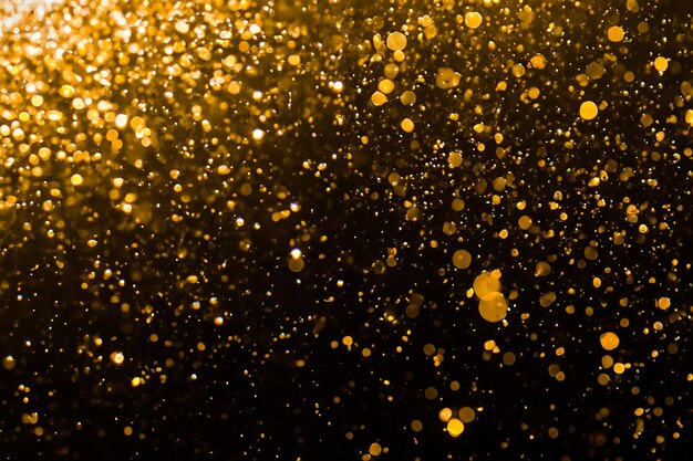Photo abstract gold bokeh with black