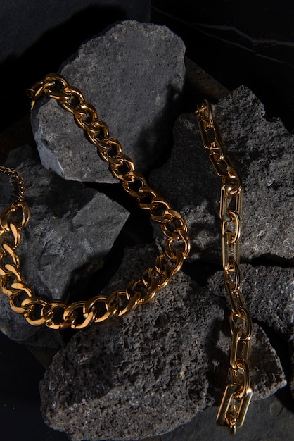 abstract gold chain jewellery presentation