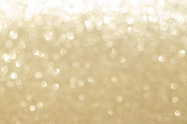 Abstract golden bokeh background defocused blurry sparkles