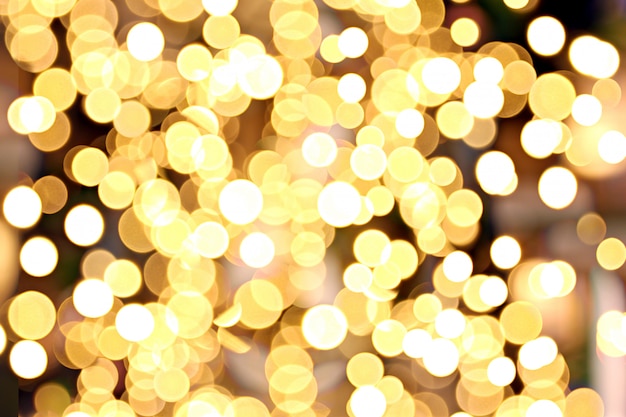 Abstract golden bokeh of Christmas background.