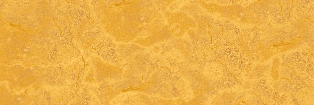 自然な石のテクスチャーと花崗岩の静脈を持つ抽象的な金色の大理石