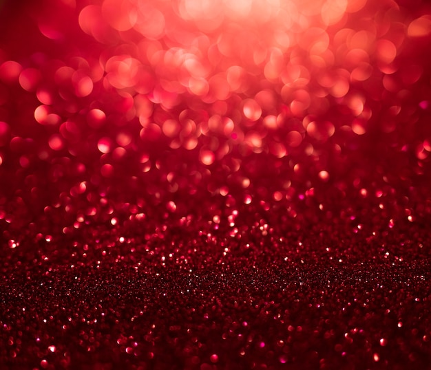 Abstract  of golden and red glitter lights with bokeh Defocused background