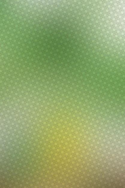 Abstract green background with a pattern of circles and stars on it