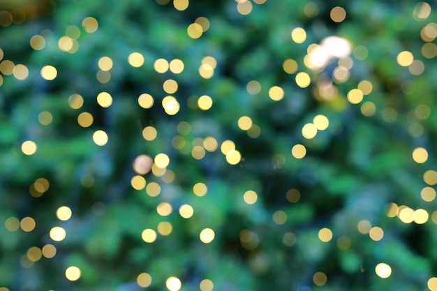 Abstract Green christmas background with bokeh lights