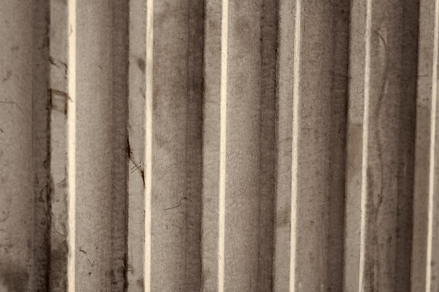 テクスチャード加工された表面の背景を持つ抽象的な灰色のセメント壁の建築構造