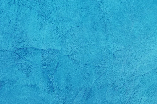 抽象的なグランジ装飾的なラフ不均一ネイビーブルーの漆喰壁の背景