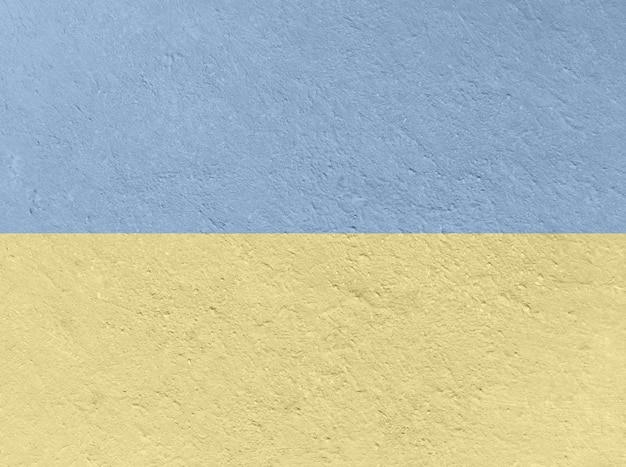 Foto fondo astratto di struttura di lerciume colorato nella bandiera blu e gialla dell'ucraina