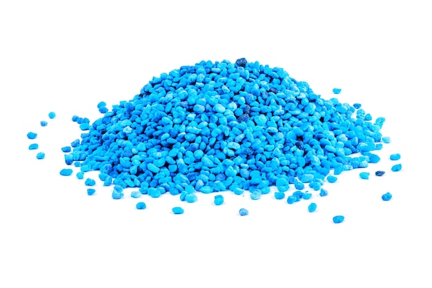 Abstract heap of blue granules isolated on white background