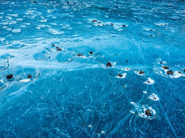 Abstract ice pattern on lake at Kerid crater old quiet volcano in Iceland in winter season