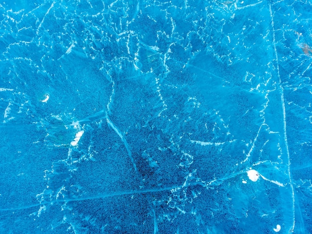 Abstract ice pattern on lake at Kerid crater old quiet volcano in Iceland in winter season