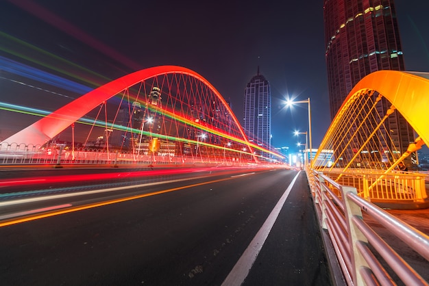 Abstract image of blur motion of cars on the city road at night