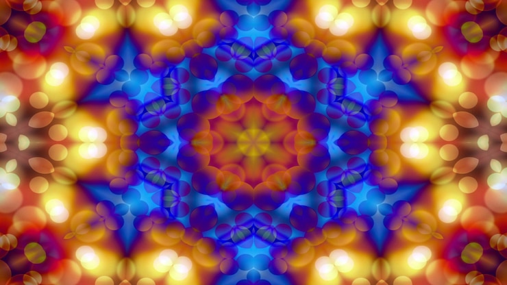 Foto abstract kleurrijk glanzend en hypnotiserend concept symmetrisch patroon sier decoratieve caleidoscoop beweging geometrische cirkel en stervormen
