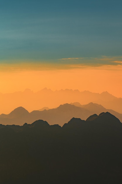 Abstract landscape of vertical mountains with orange filter