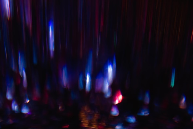 Абстрактные блики на фоне светящегося размытия праздничного фона