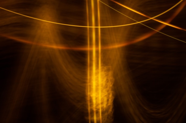 Abstract light background. yellow blured trail lights, strips\
and bokeh