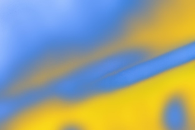 Абстрактный светло-голубой и желтый размытый фон блеска с градиентом