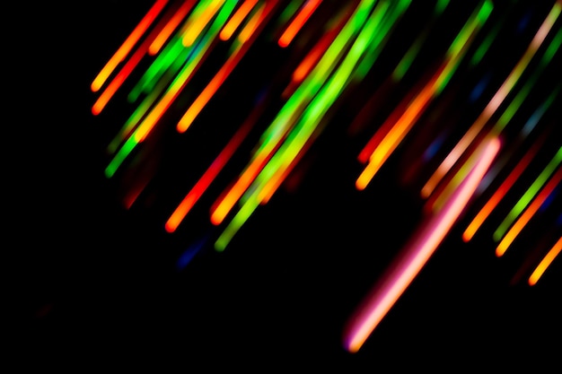 Abstract light trails blurred flowing motion Illuminated defocused fiber optics