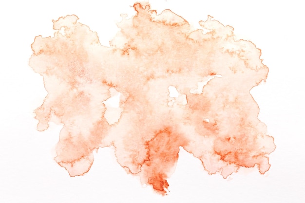 Photo abstract liquid art background brown watercolor translucent blots on white paper