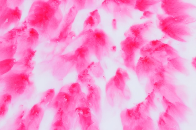 Abstract liquid background Fluid art of pink Pink stains on white liquid