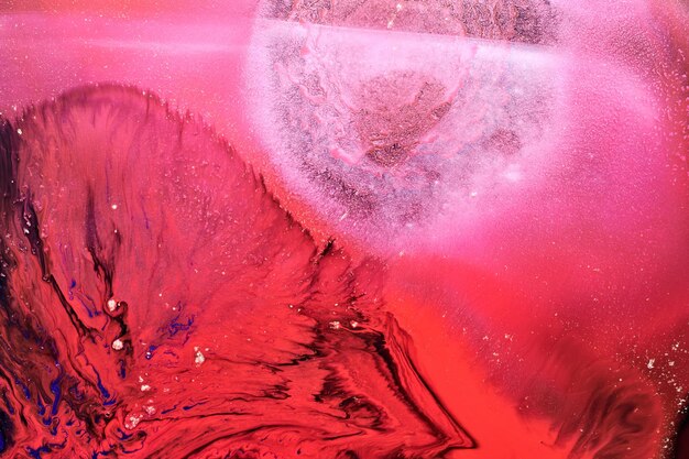 Abstract magenta background Alcohol ink streaks and stains of wine color paint splashes