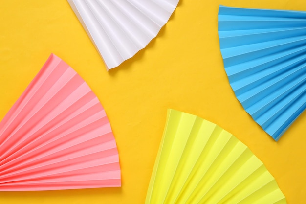 Abstract modern background Paper fan on yellow background Concept art minimalism