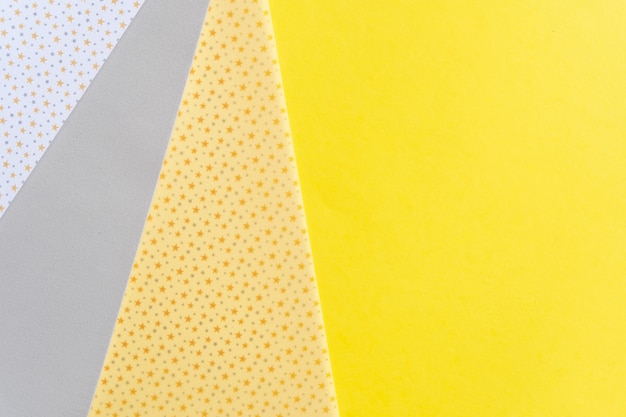 Abstract modern handmade paper background in ultimate gray and illuminating yellow colors