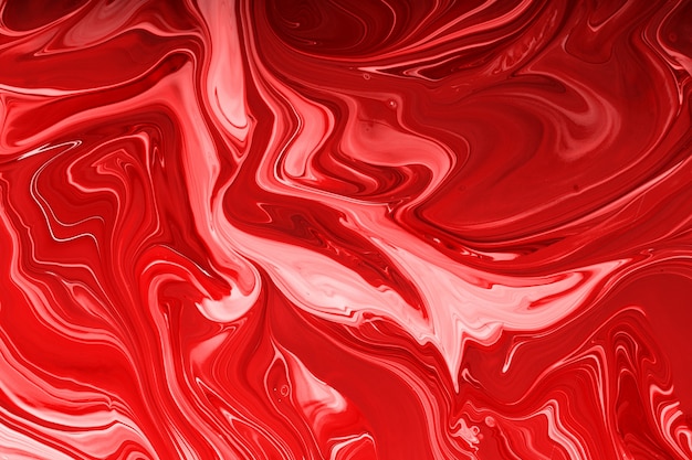 Abstract monochrome red backgroundmake up conceptBeautiful stains of liquid nail laquers