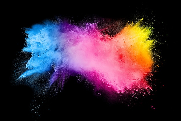 Photo abstract multi color powder explosion on black background.