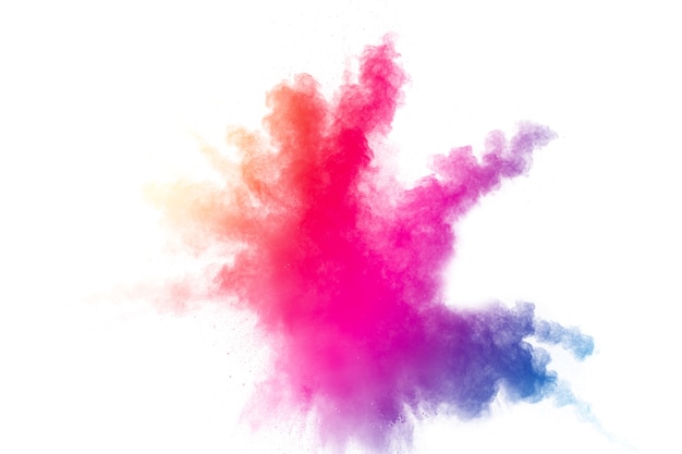 Photo abstract multicolored powder explosion on white background.