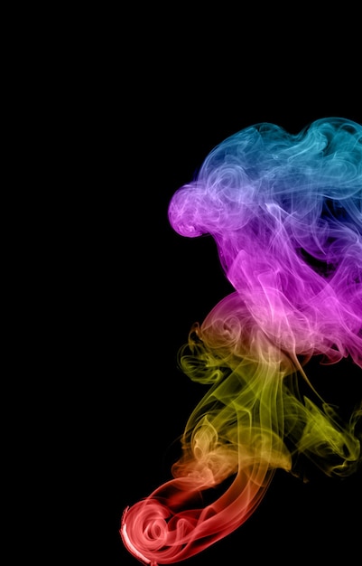 Abstract multicolored smoke on a dark background