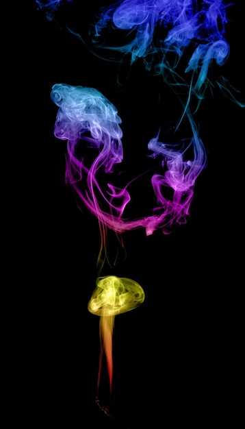 Abstract multicolored smoke on a dark background