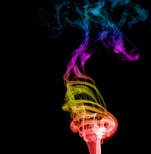 Abstract multicolored smoke on a dark background