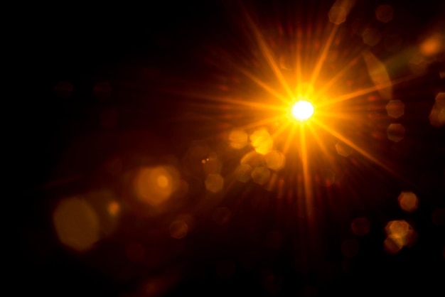 Photo abstract natural sun flare on the black