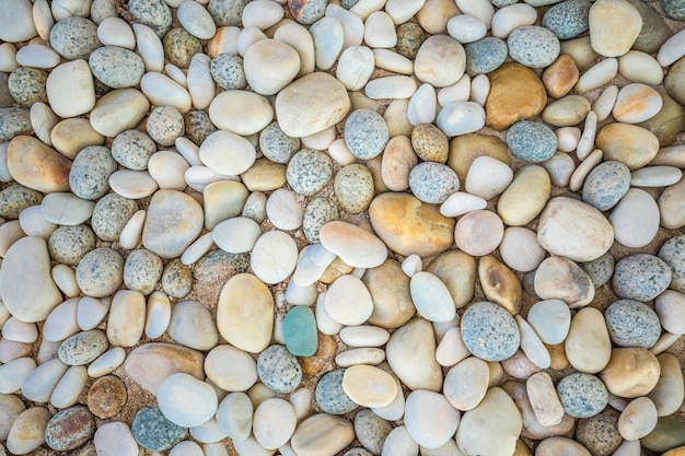 抽象的な性質の小石の背景テクスチャ。石の背景。ブルーのヴィンテージカラー。海のビーチ パターン