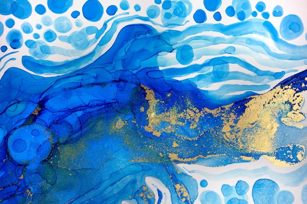 Abstract ocean foam print watercolor blue texture with gold glitter