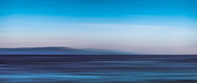 Abstract ocean wall decor background long exposure view of dreamy mediterranean sea coast