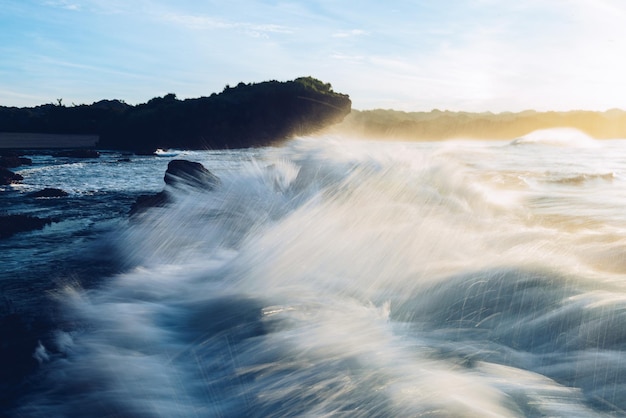 Abstract ocean waves at sunrise