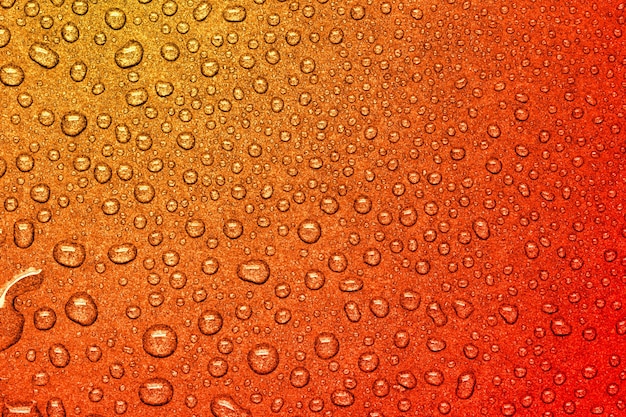 Photo abstract orange colour water drop texture