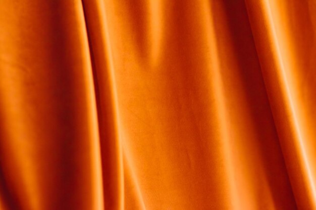 Foto tessuto arancione astratto velluto materiale tessile per tende o tende moda texture e decorazioni per la casa sullo sfondo per il marchio di interior design di lusso