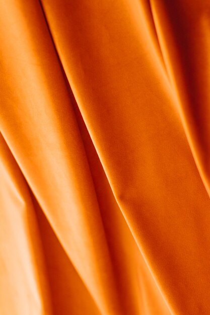 Abstract oranje stof achtergrond fluweel textiel materiaal voor jaloezieën of gordijnen mode textuur en home decor achtergrond voor luxe interieur design merk