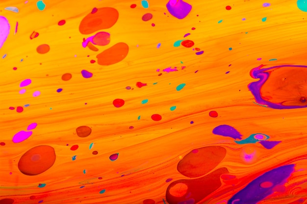 Abstract paint patterns on colorful background