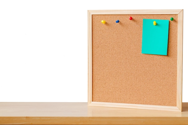 Abstract paper note pin on cork board Blank notes for add text message or design website wood frame with sticker note on table