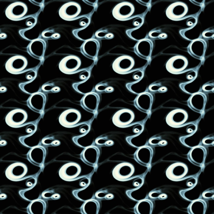 Photo abstract patterns of swirling lines and shapes in blue and white on a dark background